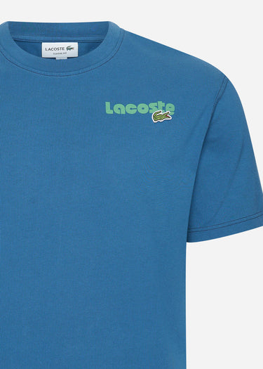 Lacoste T-shirts Lacoste backprint tee - globe