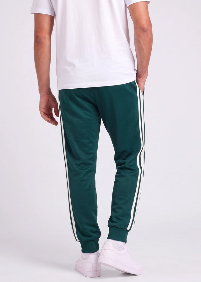 Sergio Tacchini Pants Damarindo velour pants - pineneedle